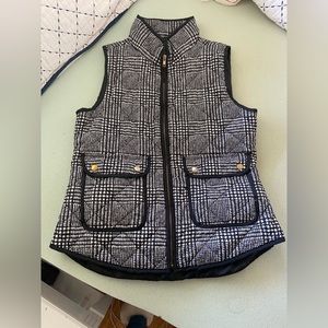Black and white light puffer vest